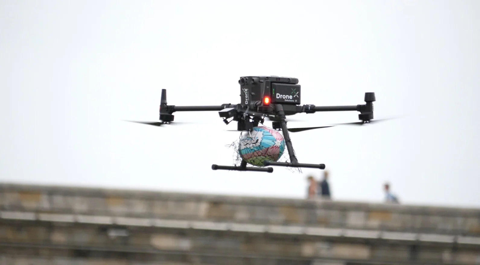 Aerial drone footage being captured at a sports event